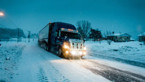 Blizzard on the Road during a Cold Winter Evening in Canada